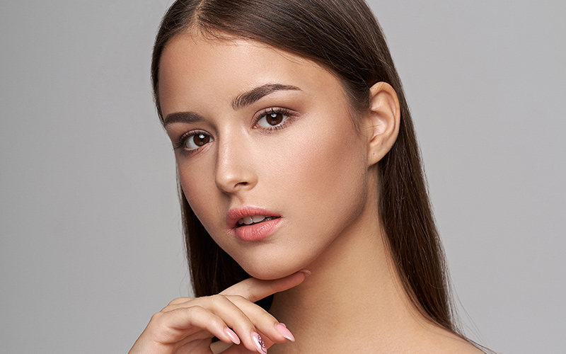 Woman representing rhinoplasty for dorsal hump correction in Philadelphia.