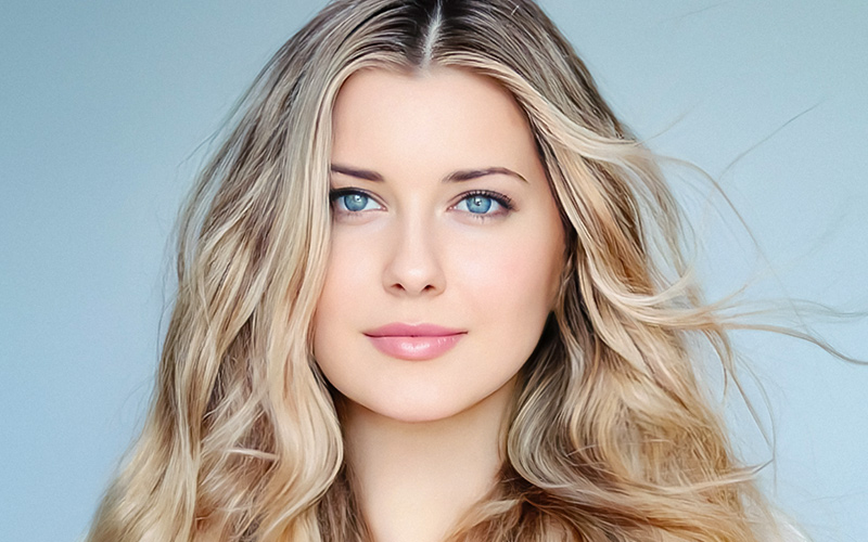 Woman with smooth, even-toned skin after SkinPen microneedling treatment.