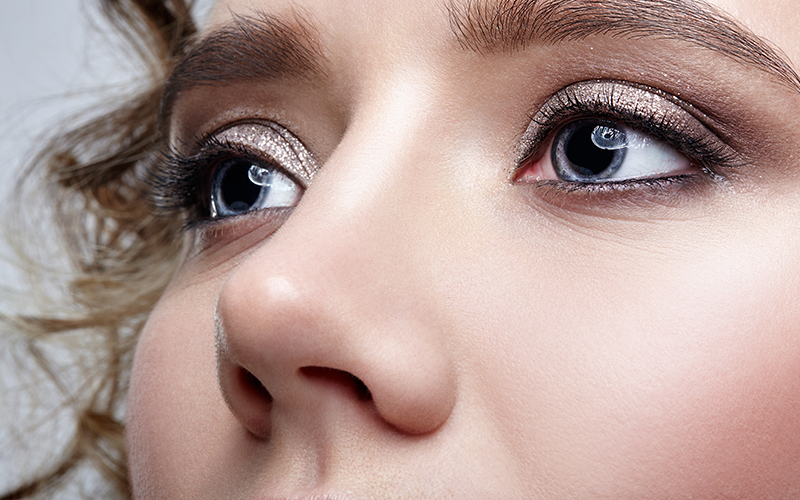 Close-up of nose and eyes highlighting wide nostrils relevant to rhinoplasty treatment in Philadelphia.