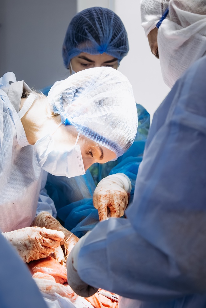 Rhinoplasty before-and-after photo results being reviewed during a nose surgery consultation.